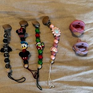 4 passifier clips and two pacifiers grinch Mickey Halloween Christmas Donald